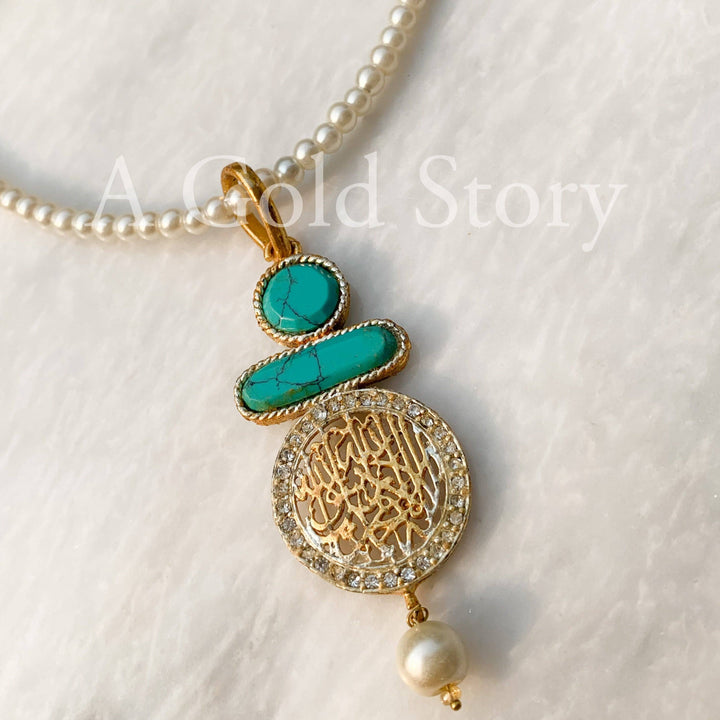 QALMA PENDANT - A GOLD STORY