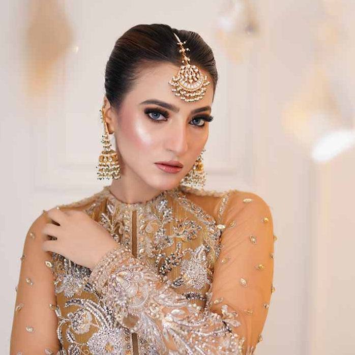 KAMALA EARRINGS AND TIKKA SET