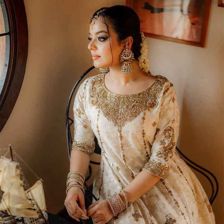 KAMALA EARRINGS AND TIKKA SET