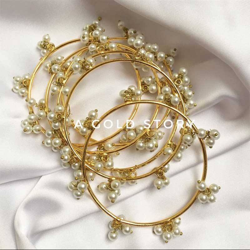 PEARL BANGLES - A GOLD STORY