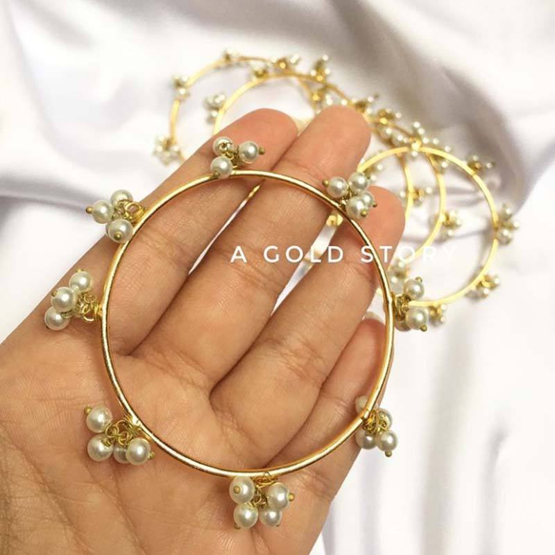 PEARL BANGLES - A GOLD STORY