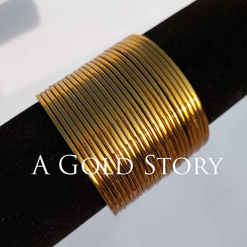 INDIAN METAL BANGLES GOLDEN - A GOLD STORY